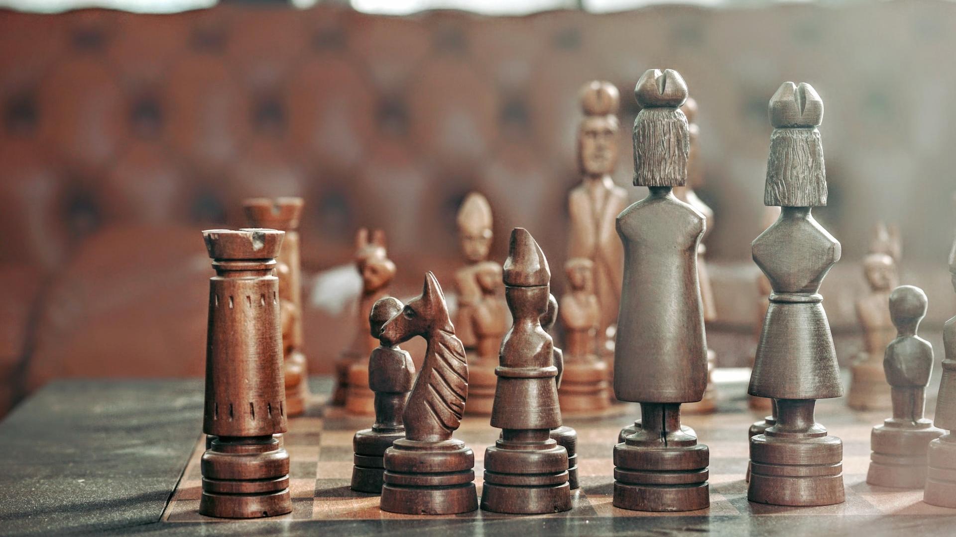 selective focus photography of chess pieces